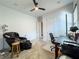 Versatile office space featuring a massage chair, functional desk, and plenty of natural light at 146 Cabo Cruces Dr, Henderson, NV 89011