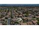 Beautiful aerial view of a home and pool surrounded by palm trees in a quiet residential neighborhood at 1509 Winslow St, Las Vegas, NV 89117