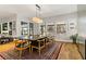 Dining room features a large table and views of the beautifully landscaped backyard at 1509 Winslow St, Las Vegas, NV 89117