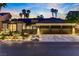 Beautiful exterior showcasing a three-car garage and desert landscaping at 1509 Winslow St, Las Vegas, NV 89117