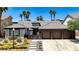 Attractive one-story home featuring a three-car garage, desert landscaping, and well-maintained exterior at 1509 Winslow St, Las Vegas, NV 89117