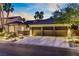 Expansive three-car garage with modern doors and well-lit driveway at 1509 Winslow St, Las Vegas, NV 89117