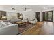 A spacious living room features hardwood floors, modern furniture, and natural light at 1509 Winslow St, Las Vegas, NV 89117