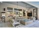 Covered patio with large windows that look out to the pool and waterfall feature at 1509 Winslow St, Las Vegas, NV 89117