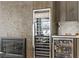 Wine cooler built into the wall in the dining area and next to the fireplace at 1509 Winslow St, Las Vegas, NV 89117