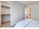 Bright bedroom showcasing closet access, plush carpeting, and natural light, offering a peaceful and inviting space at 151 Duckhook Ave, Las Vegas, NV 89148