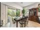 Elegant dining area with sliding glass door access to the backyard and ample natural light at 151 Duckhook Ave, Las Vegas, NV 89148