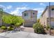 Charming two-story home with a two-car garage, landscaped front yard, and inviting curb appeal at 151 Duckhook Ave, Las Vegas, NV 89148