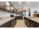Well-equipped kitchen with granite countertops, stainless steel appliances, and ample cabinet space at 151 Duckhook Ave, Las Vegas, NV 89148