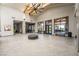 Bright lobby with modern tile flooring, vaulted ceilings, large windows, and contemporary decor at 151 Duckhook Ave, Las Vegas, NV 89148
