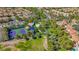 Aerial view showcasing community amenities including pool, tennis and volleyball courts at 1604 Imperial Cup Dr, Las Vegas, NV 89117
