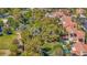 Aerial view featuring mature tree growth, a park and tile roofs at 1604 Imperial Cup Dr, Las Vegas, NV 89117