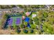 Aerial view of the property with tennis and volley ball courts, green spaces and community amenities at 1604 Imperial Cup Dr, Las Vegas, NV 89117