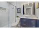 Stylish bathroom featuring a glass-enclosed shower, toilet, and modern vanity with a vessel sink at 1604 Imperial Cup Dr, Las Vegas, NV 89117