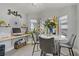 Charming dining area with a round table, stylish chairs, and bright natural light at 1604 Imperial Cup Dr, Las Vegas, NV 89117