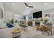 Bright living room featuring modern fireplace, open floor plan and stylish decor at 1604 Imperial Cup Dr, Las Vegas, NV 89117