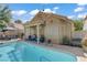 Back of house with pool and covered outdoor seating at 1604 Imperial Cup Dr, Las Vegas, NV 89117