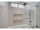 Shower features marble tiling, a glass enclosure, and modern fixtures at 1604 Imperial Cup Dr, Las Vegas, NV 89117