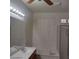Bright bathroom features a large mirror, vanity, soaking tub, and shower stall at 1652 Black Fox Canyon Rd, Henderson, NV 89052