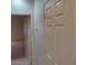 Hallway showing standard trim package and neutral wall color at 1652 Black Fox Canyon Rd, Henderson, NV 89052
