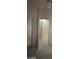 View of hallway with tile floor and white trim throughout home at 1652 Black Fox Canyon Rd, Henderson, NV 89052