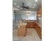 View of kitchen with an island, ample counter space, and modern appliances at 1652 Black Fox Canyon Rd, Henderson, NV 89052