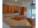 Bright kitchen features modern appliances, a central island, and ample counter space at 1652 Black Fox Canyon Rd, Henderson, NV 89052