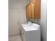 Laundry room with cabinets, washer, and dryer at 1652 Black Fox Canyon Rd, Henderson, NV 89052