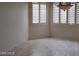 Bright living room offers ample natural light via big windows with great shutters at 1652 Black Fox Canyon Rd, Henderson, NV 89052
