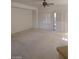 Bright, spacious living room with shuttered sliding doors, perfect for relaxation and entertaining at 1652 Black Fox Canyon Rd, Henderson, NV 89052