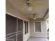 Covered patio featuring two ceiling fans at 1652 Black Fox Canyon Rd, Henderson, NV 89052