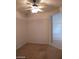 Bright room with neutral carpet and a ceiling fan at 1652 Black Fox Canyon Rd, Henderson, NV 89052