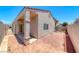 Backyard with brick-paved patio, stucco walls, and plenty of space for outdoor activities at 1717 Dwayne Stedman Ave, Las Vegas, NV 89106