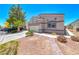 Well-maintained single-Gathering home with a two-car garage and tidy landscaping in a sunny neighborhood at 1717 Dwayne Stedman Ave, Las Vegas, NV 89106