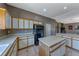 Spacious kitchen featuring ample cabinet space and a functional island at 1717 Dwayne Stedman Ave, Las Vegas, NV 89106
