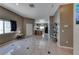 Bright living room with tile floors, a view of the kitchen, and space for flexible furniture arrangement at 1717 Dwayne Stedman Ave, Las Vegas, NV 89106