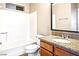 Bright bathroom featuring a granite countertop and a shower/tub combination at 2101 Sealion Dr # 108, Las Vegas, NV 89128