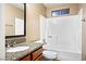 Bathroom featuring a tub and shower combo with granite countertops at 2101 Sealion Dr # 108, Las Vegas, NV 89128