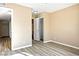 Cozy bedroom showcasing wood-look flooring, closet, and neutral paint at 2101 Sealion Dr # 108, Las Vegas, NV 89128
