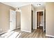 Neutral bedroom featuring hard surface flooring, closet and ensuite bathroom at 2101 Sealion Dr # 108, Las Vegas, NV 89128