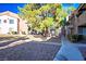 Condominium exterior showcasing walkways and meticulously maintained landscaping at 2101 Sealion Dr # 108, Las Vegas, NV 89128