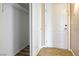 Hallway with tile flooring and closet leading to the front door at 2101 Sealion Dr # 108, Las Vegas, NV 89128