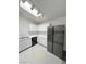 Functional kitchen with white cabinetry, modern appliances, and bright lighting at 2105 Kendall Hill Ave, Las Vegas, NV 89106