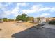 Property view in the backyard with a tree and shaded pergola at 2230 Wagon Ave, Pahrump, NV 89048