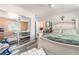 Bedroom with mirrored sliding closet doors and decorated bed at 2230 Wagon Ave, Pahrump, NV 89048