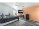 Comfortable bedroom features a ceiling fan, neutral walls, and ample natural light at 2230 Wagon Ave, Pahrump, NV 89048