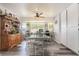 Charming dining area is bathed in natural light, with a dining table and built in cabinets at 2230 Wagon Ave, Pahrump, NV 89048