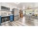 Spacious kitchen features stainless steel appliances, a dining nook, and ample storage space at 2230 Wagon Ave, Pahrump, NV 89048