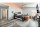 Serene main bedroom with a ceiling fan and light-colored walls, offering relaxation and comfort at 2230 Wagon Ave, Pahrump, NV 89048