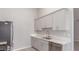 Contemporary kitchen offers stainless steel appliances, neutral cabinetry, and attractive countertops at 2305 W Horizon Ridge Pkwy # 524, Henderson, NV 89052